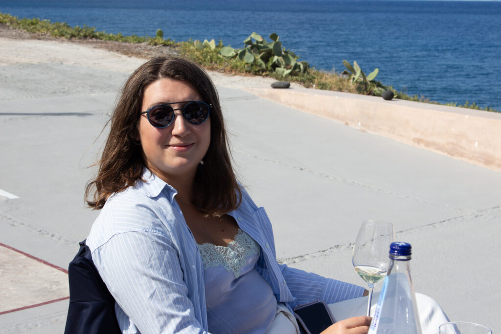 Enjoying a glass of Wine in Santorini